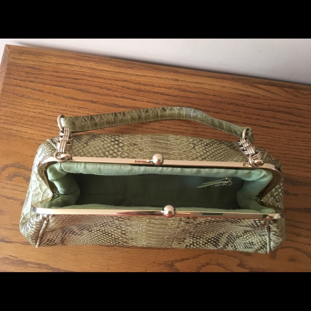 Faux reptile skin purse.